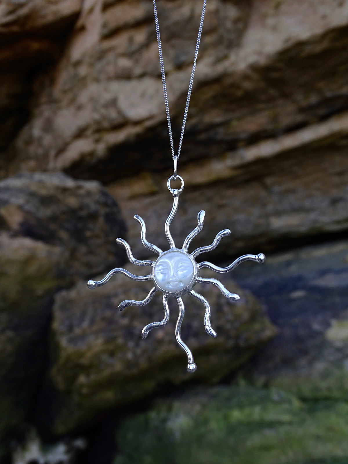 statement sun pendant