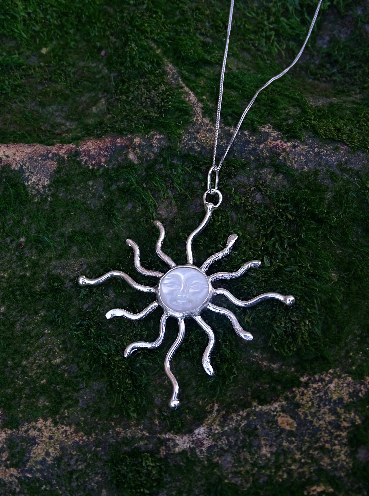 statement sun pendant